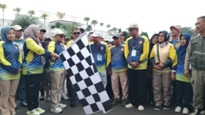 Bupati Dian Berikan Hadiah Umroh di Puncak HUT PGRI dan HGN