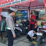 Polres Kuningan Berikan Pelayanan Gratis Service dan Ganti Oli kepada Puluhan Driver Ojol